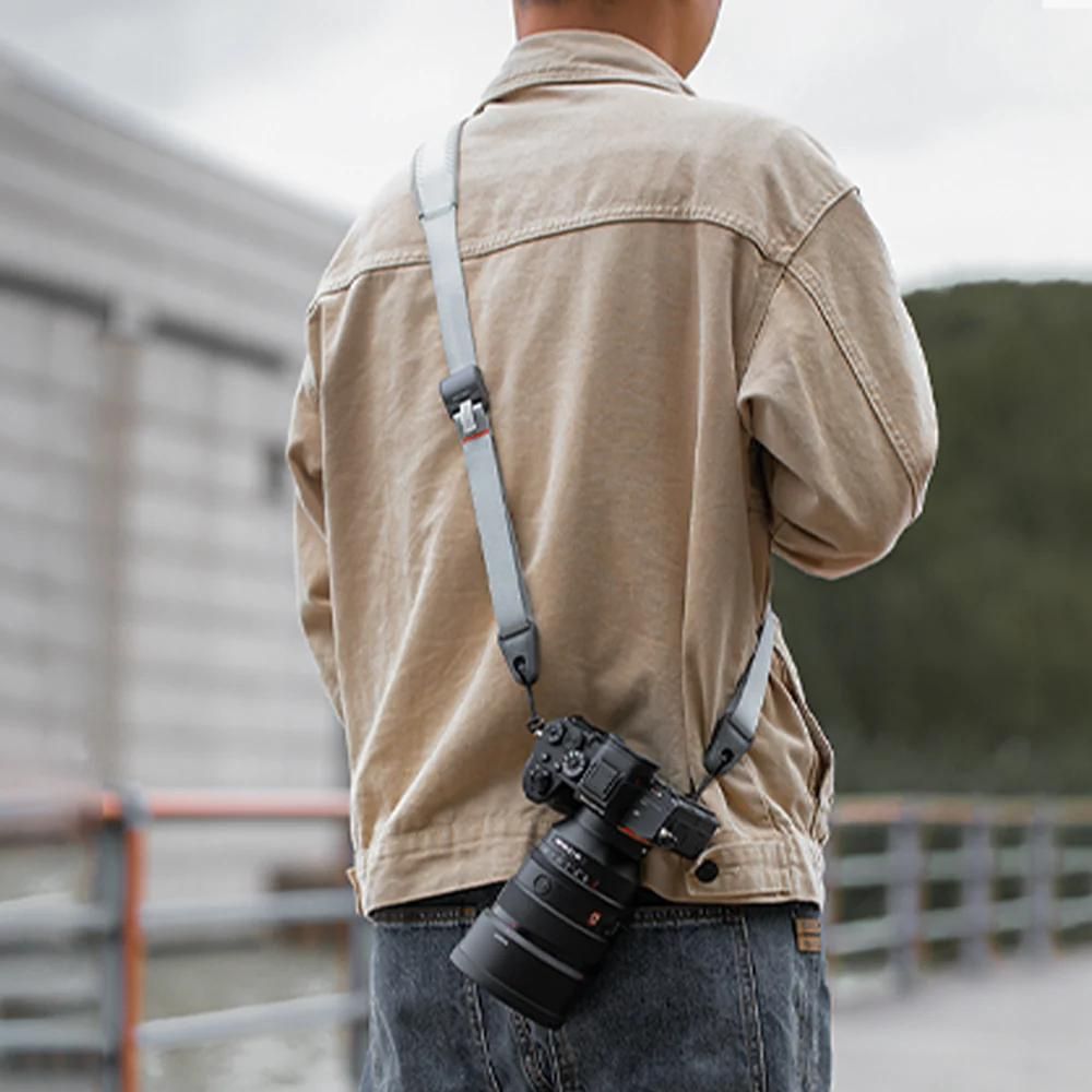 Bandoulière pour appareil photo avec fermeture rapide Bandoulière pour appareil photo avec fermeture rapide